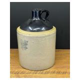 Garage…Vintage Western Stoneware Co. one-gallon crock jug featuring a two-tone glaze with a dark brown top and a beige body. See pictures for details.