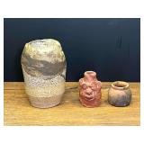 LR… Lovely, unusual artisan pottery vase, also includes a miniature ugly face jar, and a miniature pottery bean jar. See pictures for details.