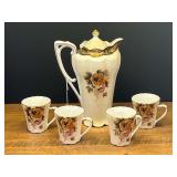 Garage… Beautiful Nippon hand painted chocolate pot with floral motif, comes with 4 cups, see pictures for detail.