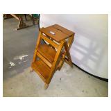 Garage… Three tier folding stepstool/ladder, see pictures for details.