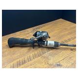 Garage… Rhino fishing rod with a Zebco 11 micro spin cast reel. See pictures for details.