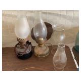Garage… Vintage kerosene oil lamp, converted electric oil lamp, and two chimneys. See pictures for details.