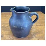 Garage… Kim Black folk art pottery pitcher, see pictures for details.