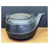 Garage… Antique cast-iron kettle, #8, see pictures for details.