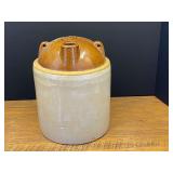 Garage…Vintage two-tone stoneware ginger beer or liquor jug featuring a cream-colored glazed body, see pictures for details.