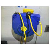 Garage… Northern industrial 33’ 16 AWG cord reel, with cord, wall mounted, see pictures or details.
