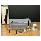 Bath…Assorted household items and decor to include magnifying glasses, porcelain Bell, bottle stopper, art glass miniature mushroom, and more. See pictures for details.
