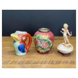 LR...Assorted Ceramic Decorative Pieces Including Bird Pitcher, Floral Vase, and Cherub Dish