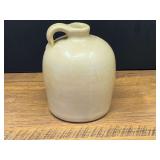 Garage… Vintage beige stoneware jug with an offset loop handle and a crackle glaze finish from Marshall Texas, see pictures for details.