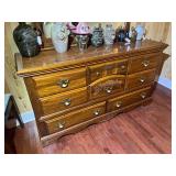 BR2…Vintage wood eight drawer dresser with an attached landscape mirror from Florida furniture industries, items shown in pictures are sold in separate lots, see pictures for details.