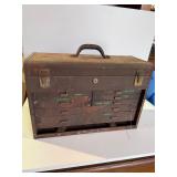 All metal toolbox full of tools