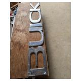 Plastic Buick letters cracked / broken