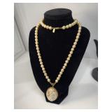 Cameo faux pearl necklace