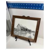 Framed farm art on iron stand
