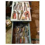 Metal three drawer cabinet full of tools