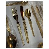 22 piece new gold tone silverware
