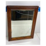 Antique framed beveled edge glass barber mirror
