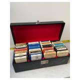 Group of 8 track tapes in hard case