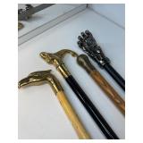 Brass head eagle, mermaid assorted cane group lot