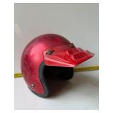 Candy red motorcycle helmet
