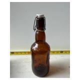 Grolsch amber brown beer bottle
