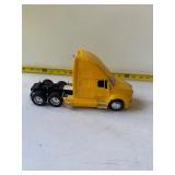 Yellow Kenworth truck
