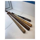 Group of vintage baseball / softball bats