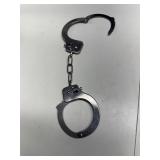 Metal quick release prop handcuffs