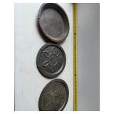 Vintage pot covers or hot plates