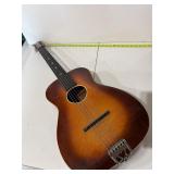 vintage Silvertone parlor-style acoustic guitar