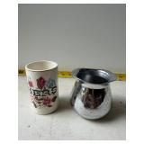 Silver color  creamer and ï¿½hersï¿½ cup