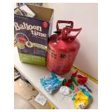 Helium tank with balloons