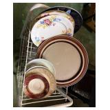Metal bar cart on wheels with miscellaneous...