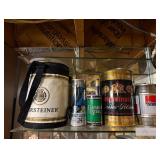 vintage metal beer kegs and cans