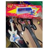 vintage toy electric guitars and organ