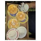 misc glass saucers with teacups