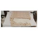 Two vintage doily style table covers