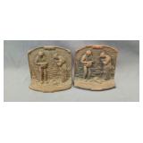 Antique cast iron raised figure bookends