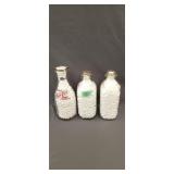 3 glass milk bottles