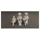Three porcelain figurines