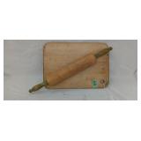 Vintage wooden rolling pin and cutting board