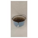 Antique enamel coated cast iron kettle