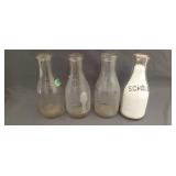 4 vintage quart milk bottles