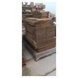 Skid of various size cardboard boxes