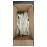 Box of flat white soapstone marking sticks