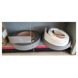 3 rolls of thermoplastic rubber wall base 4' ht.