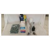 Glue sticks, scouring pads, metal bracket and bar,
