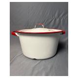 Vintage white enamelware pot with red trim