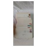 Box of assorted letter mail envelopes with stamps
