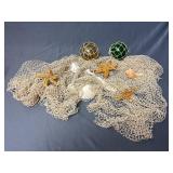 Decorative fishnet seashells, glass fishing floats